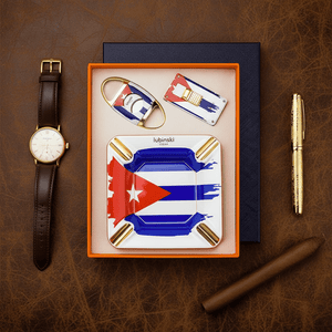 Coffret pour amateur de cigares en céramique et acier, composé d'un briquet tempête, d'un coupe - cigare et d'un cendrier -