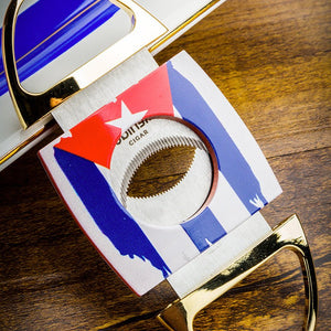 Coffret pour amateur de cigares en céramique et acier, composé d'un briquet tempête, d'un coupe - cigare et d'un cendrier - 